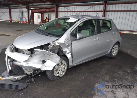 2013 Toyota Yaris Le z USA, uszkodzony, nr VIN JTDKTUD32DD559401